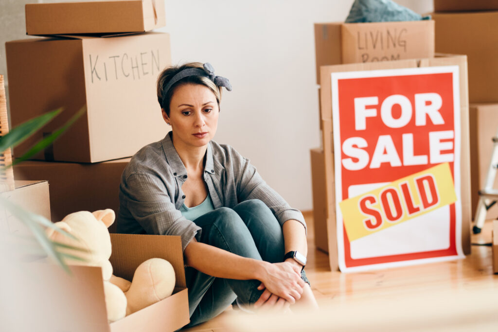 Sitting woman that sold her home fast.